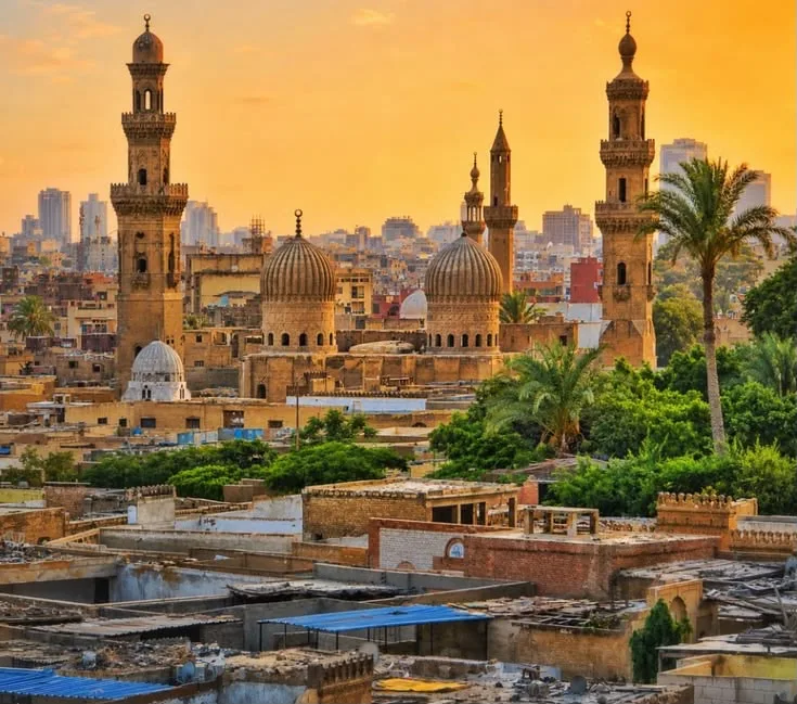 The minarets and rooftops of Islamic Cairo at golden hour