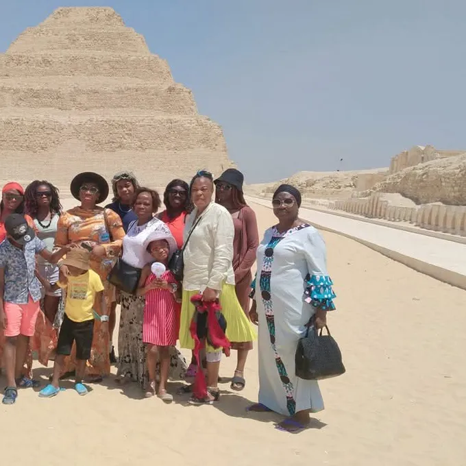 A large family group celebrating at the Step Pyramid of Saqqara
