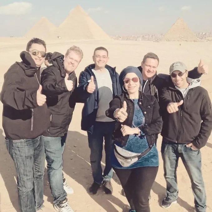 A travel group on the desert plateau at Giza