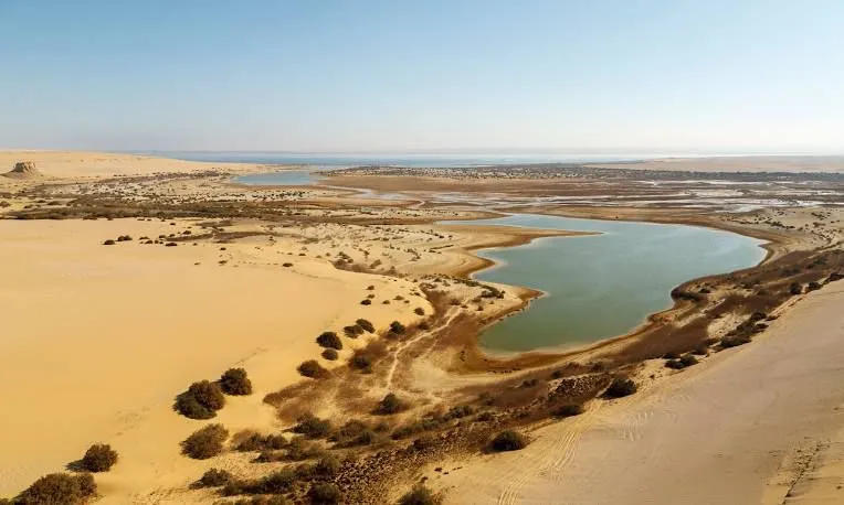 Magic Lake among the dunes of the Fayoum desert