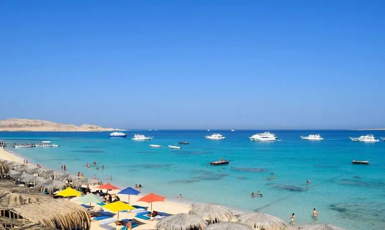 Boats moored off the beach at Hurghada on the Red Sea