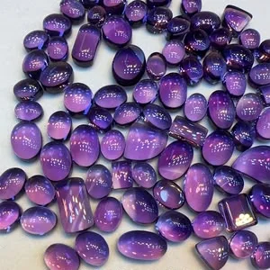 Polished amethyst cabochons