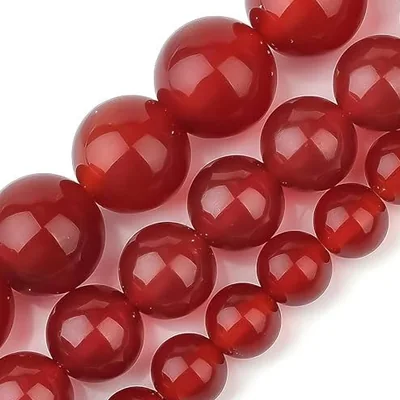 Strands of polished carnelian beads