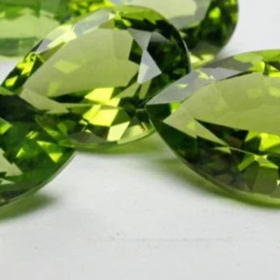 Pear-cut peridots