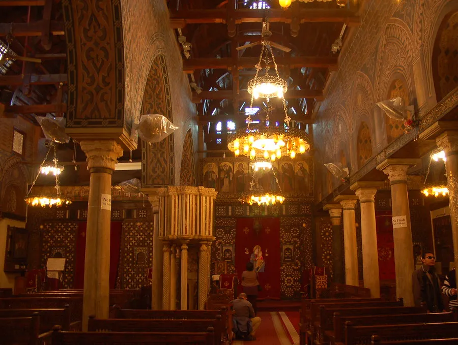 The nave of the Hanging Church in Coptic Cairo, with its wooden ceiling and hanging lamps